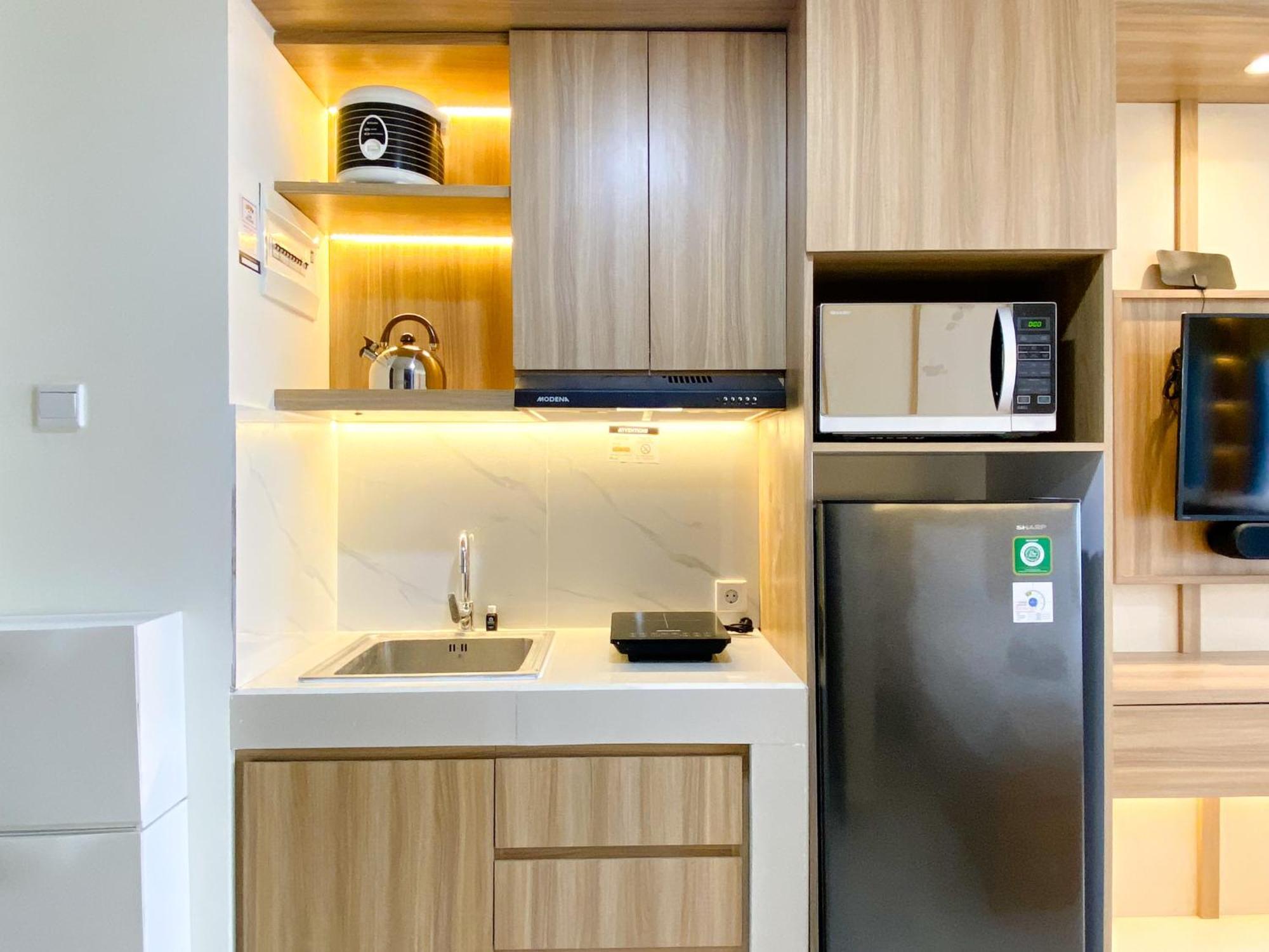 Homey And Warm Pollux Chadstone By Travelio Apartemen